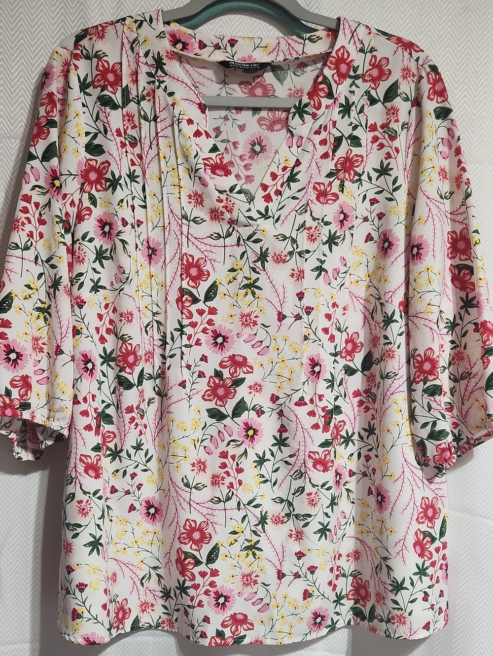 BloomChic White V-Neck Blouse with Pink & Yellow Floral Print